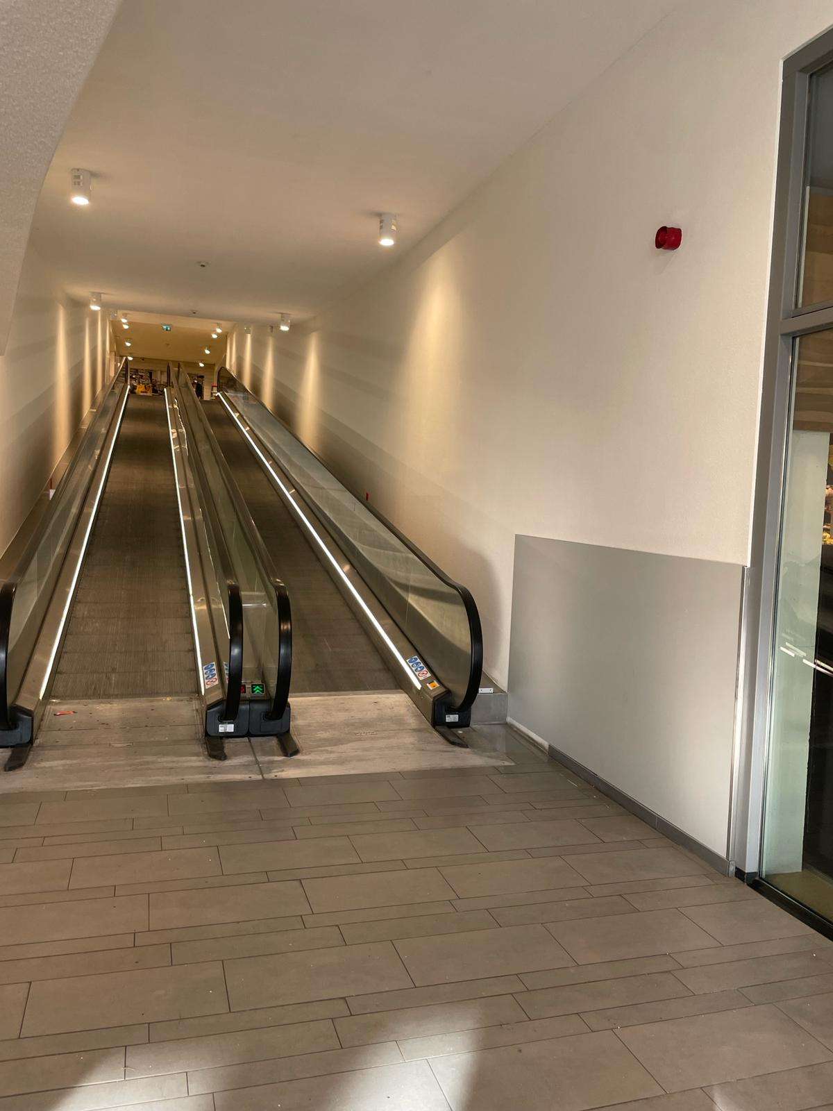 schilderwerk bij roltrap